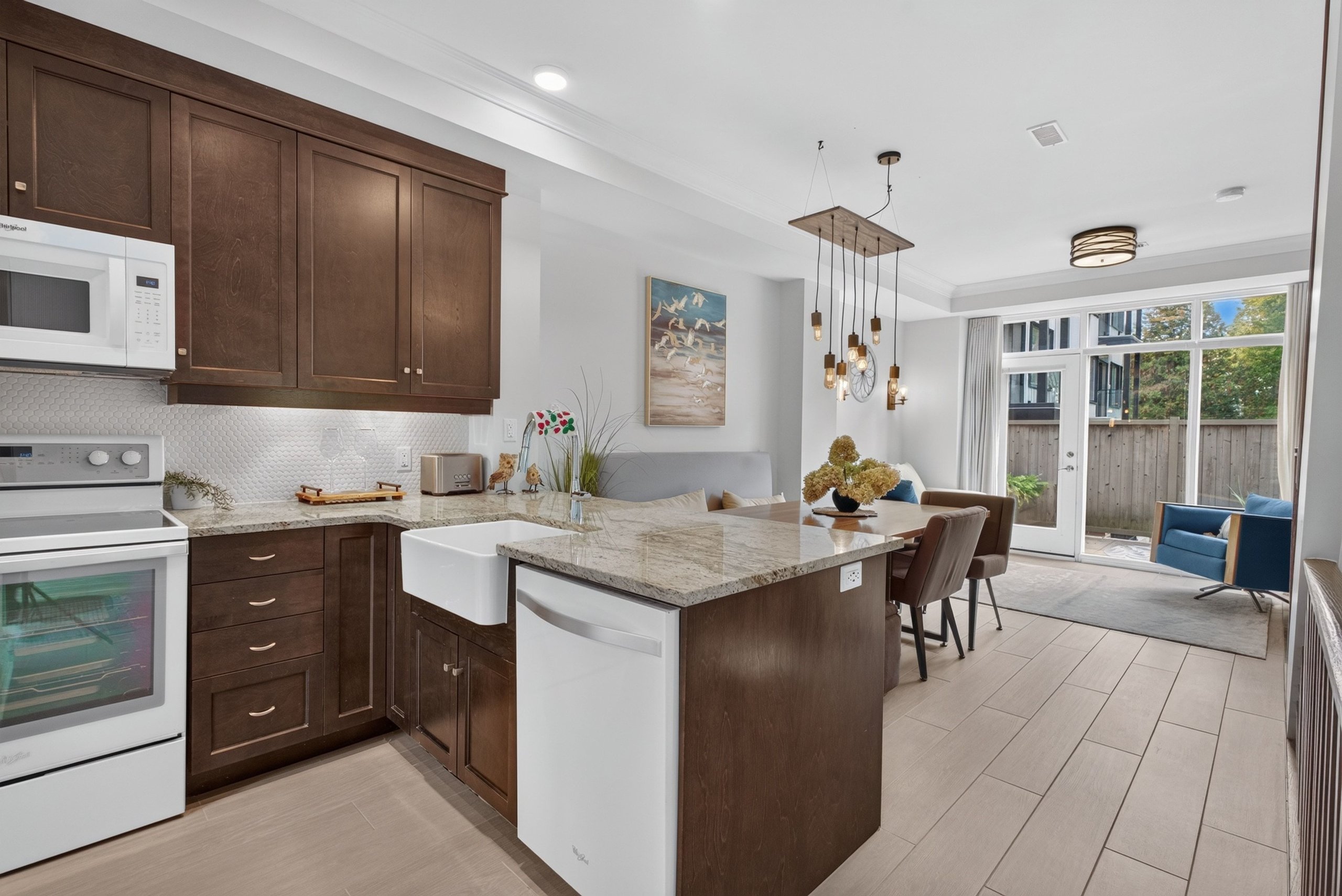 Granite kitchen with farmhouse sink